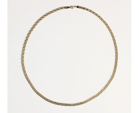 A yellow metal flat curb link chain, with attached spring ring clasp, stamped '9KT', overall length 46.5cm, gross weight 7gms