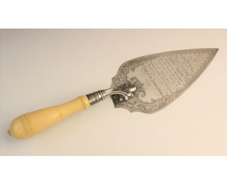 A Victorian silver presentation trowel by William Hutton & Sons, London 1876, the carved ivory handle with beaded borders, th