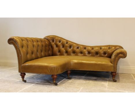 A Victorian olive green leather Chesterfield corner settee, of 'L' shape, the shaped back rest uniting a short and long arm r