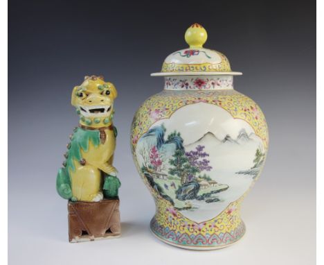 A Chinese famille juan ginger jar and cover, Qianlong four character mark, decorated with two vignettes of extensive landscap