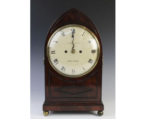 An early 19th century mahogany bracket clock, of lancet form, signed 'Campbell Oswestry', the 20cm white enamel dial with Rom