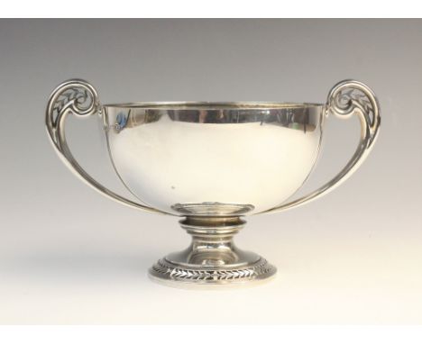 A George V twin-handled silver pedestal dish by Deakin &amp; Francis, Birmingham 1924, of circular form with pierced scrollin