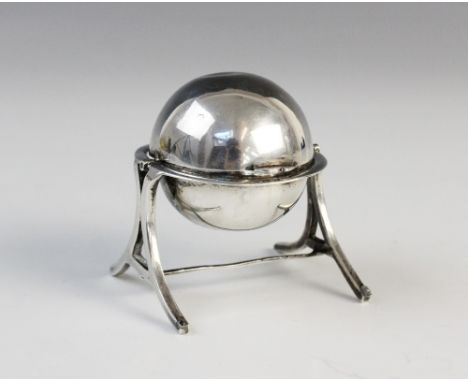 An Edwardian silver inkwell, Saunder &amp; Shepherd, Birmingham 1909, modelled as a globe on A-frame stand with retractable c