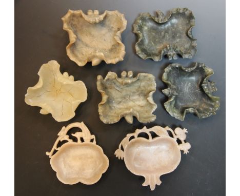 A collection of Chinese carved figures, 19th century and later, to include, soapstone, jadeite and spinach jade examples, dep