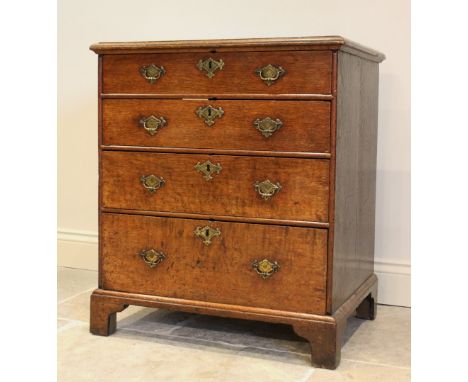 A 19th century oak bachelor's chest, the rectangular thumb moulded top above four graduated long drawers, raised on bracket f