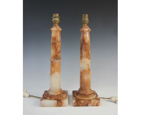 A pair of rouge onyx column lamp bases, each of doric form on square plinths, 30cm high excluding fitting (2) Lighting lots a