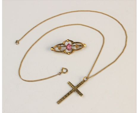 A 9ct gold cross pendant, with engine turned decoration, stamped '9ct' to reverse, 19mm x 31mm, set to a 9ct gold curb link c