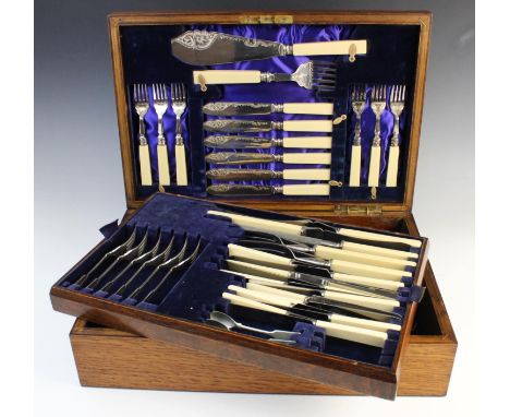 An oak cased canteen of bone handled silver plated 'Wardonia' cutlery by Thomas Ward &amp; Sons of Sheffield, late 19th/early