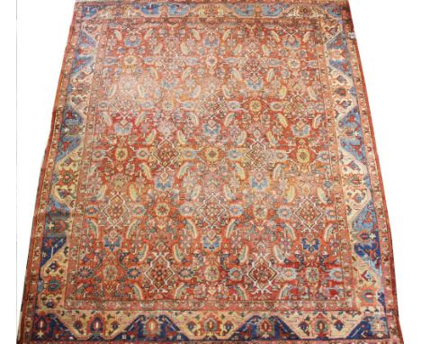 A Persian Mahal type carpet, decorated with an all-over geometric design against a red ground, 286cm x 240cm Provenance: Ruyt