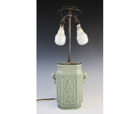 A celadon Longquan type glazed Kong lamp base, Ming Dynasty style, of canted rectangular form externally decorated in relief 