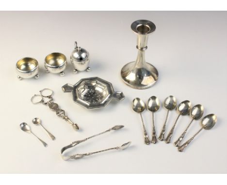 An Edwardian three-piece silver condiment set by Hilliard &amp; Thomason, Birmingham 1904, comprising two open salts and a we