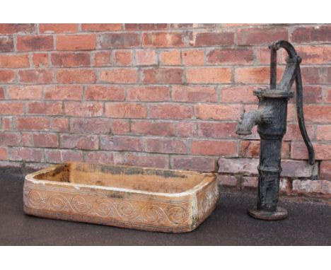 An early 20th century salt glazed feed trough, with incised scrolling foliate detail to three sides, 73cm wide, along with a 