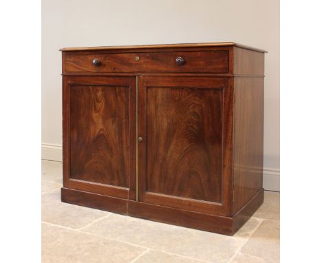 A mid 19th century mahogany specimen chest, with rectangular leather inset top, above a single drawer and cupboard below with