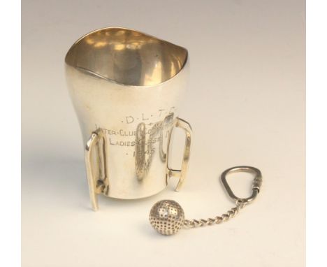 An Irish silver miniature trophy cup by T Weir &amp; Sons, Dublin 1945, of tapered form with waved border on three raised fee