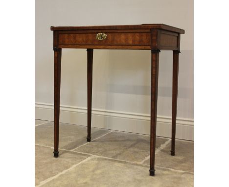 A late 19th century kingwood writing table, the rectangular sliding top with a central herringbone parquetry panel enclosed b