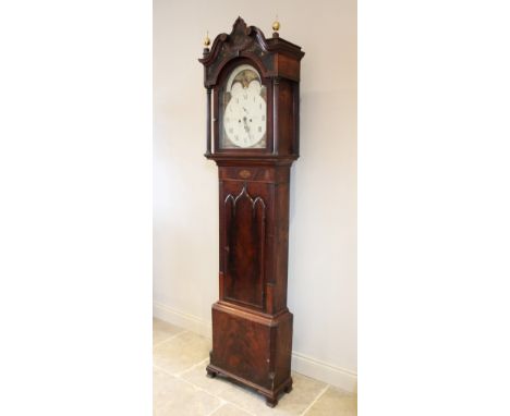 A George IV mahogany eight day longcase clock by John Heywood, Northwich, the break arch dial with moon phase above a 35cm pa