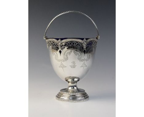 A Victorian silver swing-handled sugar basket by Henry Wilkinson &amp; Co, London 1872, the tapering bowl with scalloped bord