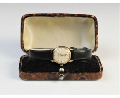 A lady?s vintage Omega Geneve 9ct gold wristwatch, the circular cream dial with dagger indexes, set to a plain polished 9ct g