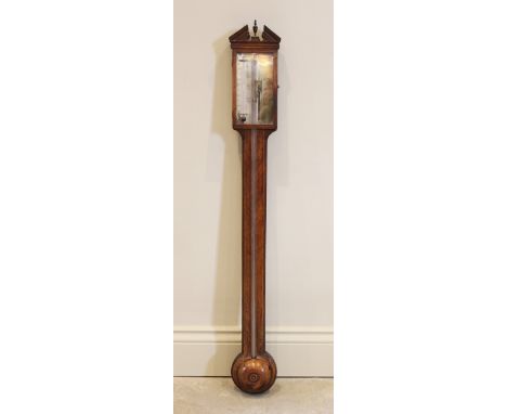 A George III mahogany stick barometer by J Testi, the broken architectural pediment above an 18cm silvered dial signed with t