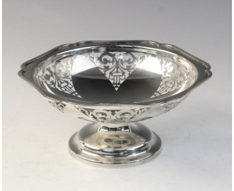 An Art Deco silver bon-bon dish by Walker &amp; Hall, Sheffield 1923, of hexagonal form with pierced decoration on stepped ci