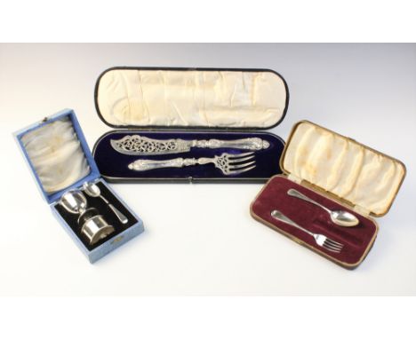 A boxed silver Christening set by Adie Brothers, Birmingham 1938, comprising egg cup, spoon and napkin ring, together with a 