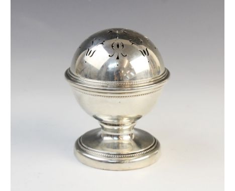 A silver pomander, Birmingham 1929 (maker's marks worn), of globe form with beaded border and pierced cover on circular weigh