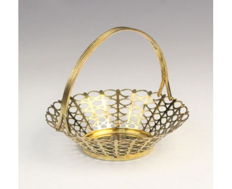 A silver gilt bon-bon basket by Adie Brothers Ltd, Birmingham 1958, of tapered circular form with pierced decoration, detacha