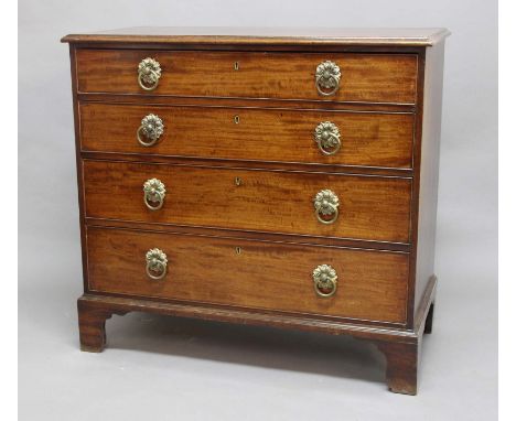 GEORGE III MAHOGANY CHEST, the four graduated and cockbeaded drawers with floral and ring pulls on ogee bracket feet, height 