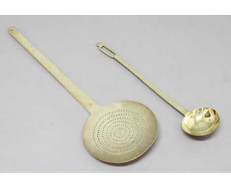 LARGE BRASS SKIMMER, 18th century, with maker's mark, length 60cm; together with a brass ladle (2). For the skimmer: c.f. But
