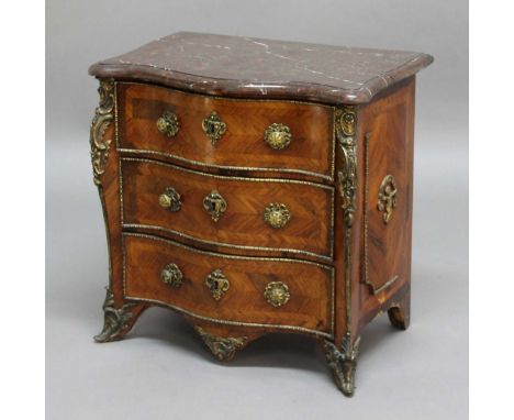 FRENCH LOUIS XVI STYLE MINIATURE KINGWOOD SERPENTINE COMMODE, circa 1900, the red marble top above three drawers veneered to 