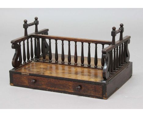 REGENCY ROSEWOOD BOOK TROUGH OR PORTER, with baluster turned gallery and handles above a single drawer fitted with a pen rest