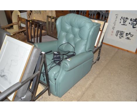 A button back electric reclining armchair