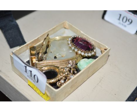 A Victorian yellow metal brooch; a lady's gold plated Rotary wrist watch; small jade items; a yellow metal amethyst and pearl