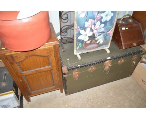 A metal bound travelling trunk