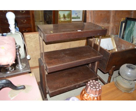 A metamorphic three tier table/buffet