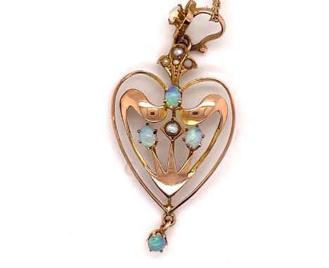 AN ART NOUVEAU HEART SHAPE SEED PEARL AND OPAL PENDANT WITH AN ATTACHED OPAL DROPPER, AND SUSPENDED ON A 9ct GOLD  PRINCE OF 