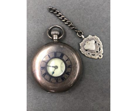 A SILVER HALLMARKED J.W.BENSON LONDON 15 JEWELLED POCKET WATCH COMPLETE WITH ATTACHED CHAIN AND FOB. POCKET WATCH DATED 1933,