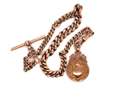 AN ANTIQUE ROSE GOLD GRADUATED WATCH ALBERT WITH ATTACHED T-BAR AND FOB. THE ALBERT STAMPED 9.375 ON EACH LINK, THE T-BAR SIM