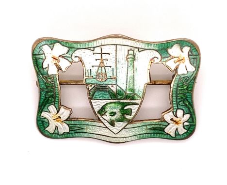 A STERLING SILVER, GILDED AND ENAMEL BROOCH, DECORATED WITH A COASTAL PORT TOWN CREST WITHIN A FLORAL BORDER. STAMPED STERLIN