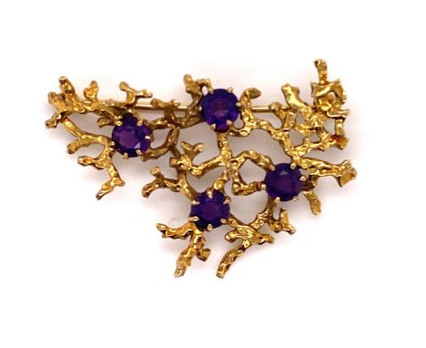 A VINTAGE 9ct GOLD HALLMARKED YELLOW GOLD AND AMETHYST STYLISED BROOCH. DATED 1973, LONDON, SIGNATURE INDISTINCT. POSSIBLY C&