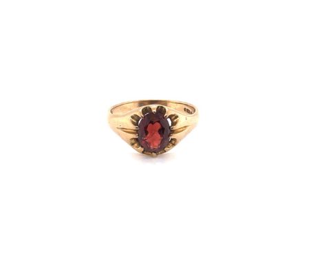 A VINTAGE 1950'S GENTS GARNET SIGNET RING. THE OVAL GARNET IN A CLAW SETTING. HALLMARKED LONDON 1955. FINGER SIZE S. WEIGHT 3