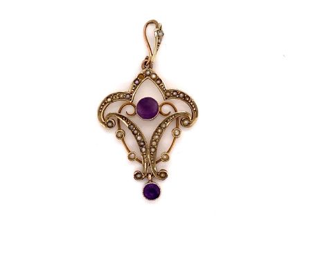 AN ART NOUVEAU AMETHYST AND SEED PEARL PENDANT WITH ARTICULATING AMETHYST DROPPER. UNMARKED, ASSESSED AS 9ct. DROP INCLUDING 
