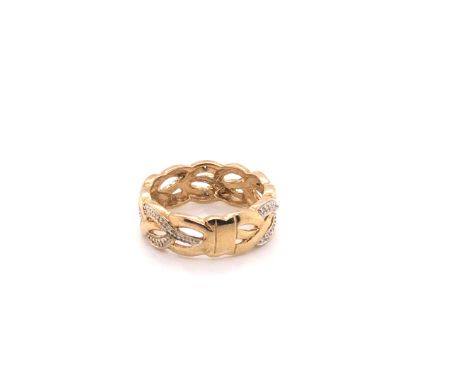 A 9ct HALLMARKED YELLOW GOLD AND DIAMOND WOVEN RING. WIDTH OF RING 6.2mm, FINGER SIZE K, LEADING EDGE. WEIGHT 3.1grms. 