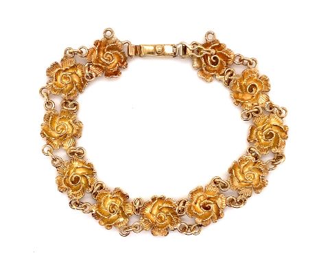 A VINTAGE 9ct YELLOW GOLD HALLMARKED STYLISED ROSE LINK BRACELET. DATED 1983. LENGTH 19cms. WEIGHT 16.5grms. 
