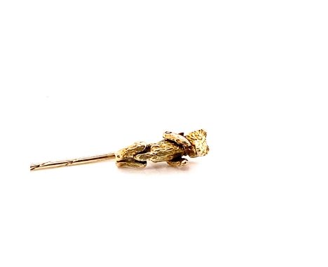 A REMODELLED ARTICULATED BEAR STICK PIN. THE BEAR ORIGINALLY A 9ct GOLD CHARM, MOST OF THE HALLMARK OBSCURED WITH THE ADDITIO