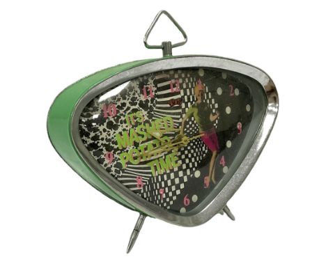 1960's 'It's Mashed Potato Time' alarm clock of triangular form, H10.5cm