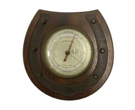 Short &amp; Mason of London Stormoguide barometer, mounted on mahogany horseshoe shaped plaque, L17cm