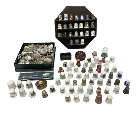 Large collection of thimbles, to include Cloisonné, ceramic, glass and metal examples, together with a display shelf and souv