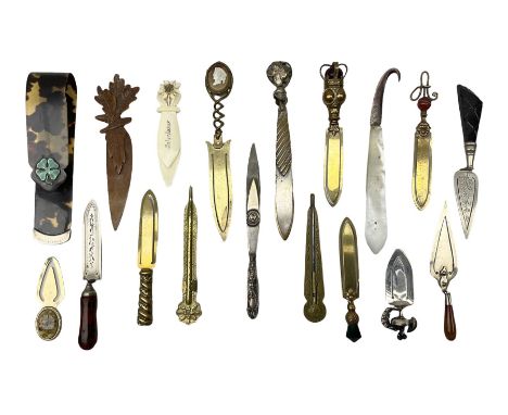 Collection of page markers,to include three trowel shaped examples, carved wooden marker with foliate detail, mother of pearl