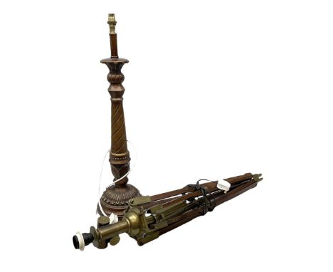 Industrial style floor standing on a wooden tripod base, together with wooden table lamp, with a circular stepped base and a 